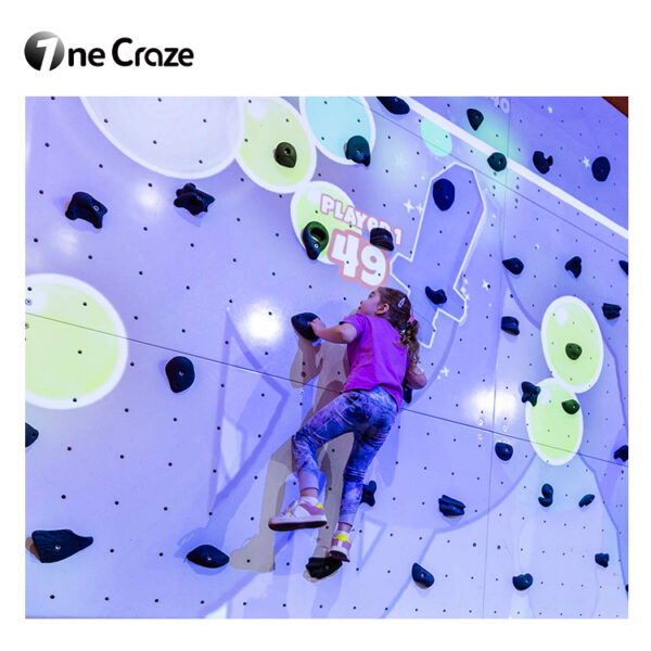 Virtual reality rock climbing wall projections
