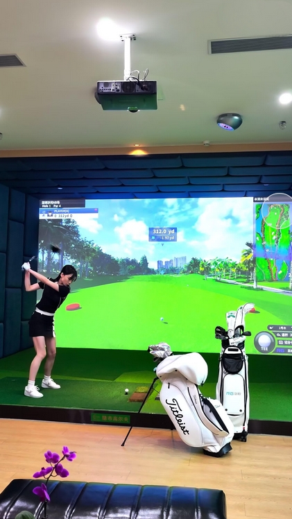 Affordable black rear panel golf simulator setup
