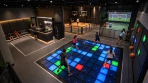 100–300 m² active game center layout with interactive LED floor, sports wall, basketball and reception area