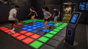 Self-service interactive LED floor game system with RFID and QR access for a family entertainment center